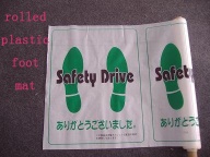 Plastic/paper foot mat