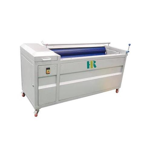 Brushing the surface of the material with a nylon silk roller to complete the cleaning, polishing and peeling treatment;