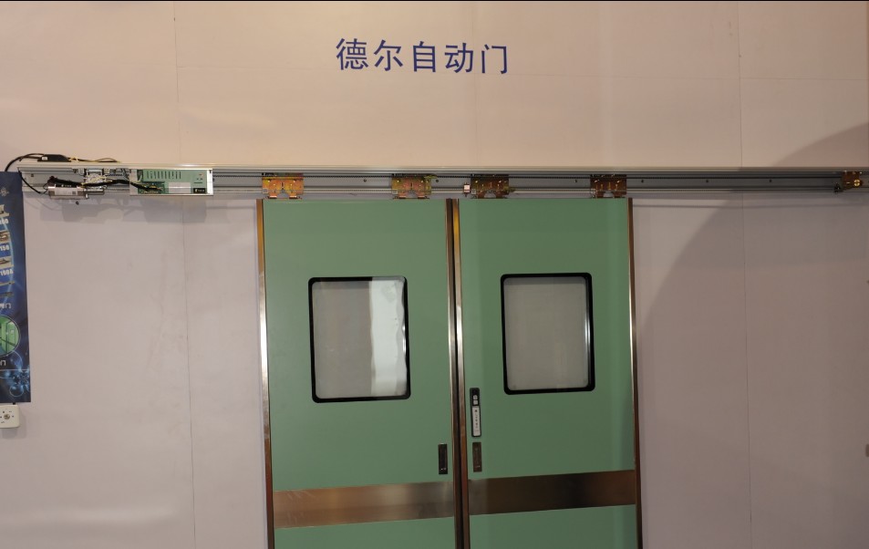 Automatic Sliding Door Operator TR-600 1. Automatic door, 100W motor, for heavy-duty doors 2. Automatic door, Auto reverse 3. CE certifacated